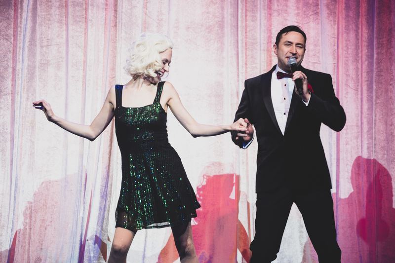 A dance duet in green sequins