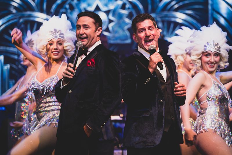Silver showgirls and sharp suits
